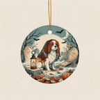 Cavalier King Charles Halloween Poster Ceramic Tree Ornament round ceramic ornament by Tritan, laid flat on a warm limestone surface