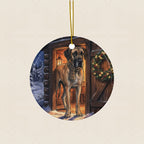 Great Dane Christmas Storybook Ceramic Tree Ornament round ceramic ornament by Tritan, laid flat on a warm limestone surface