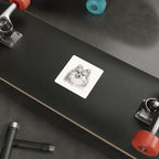 Pomeranian Graphite vinyl sticker by Tritan, on a skateboard