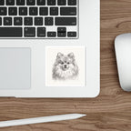 Pomeranian Graphite vinyl sticker by Tritan, on a laptop