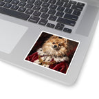 Pomeranian Kings & Queens vinyl sticker by Tritan, on a laptop