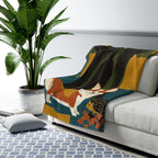 Corgi sherpa blanket by Tritan, on sofa