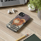 Pomeranian tough phone case by Tritan, on a desk