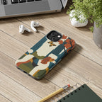 Poodle tough phone case by Tritan, on a desk