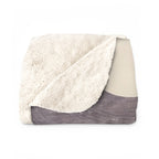 Poodle sherpa blanket by Tritan, folded