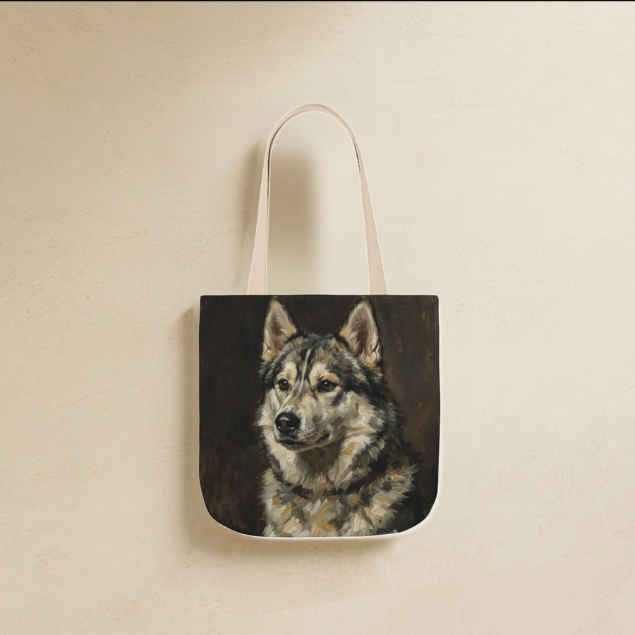Siberian Husky Tote Bag canvas tote bag hanging by its handles against a warm limestone wall