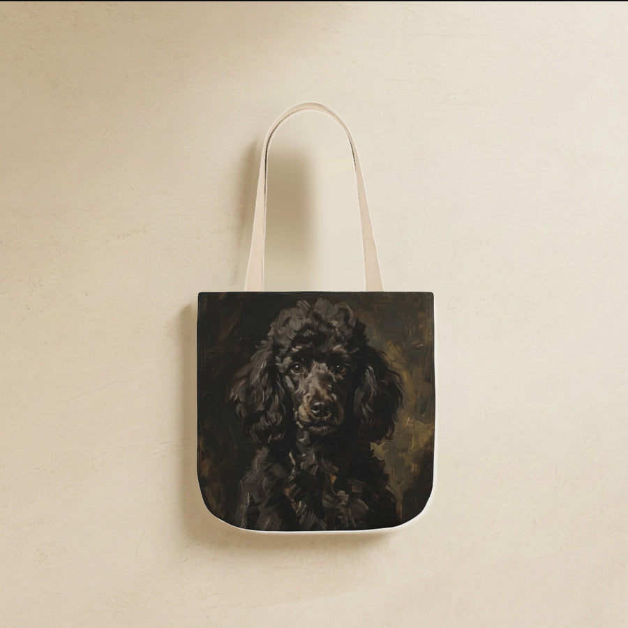 Standard Poodle Tote Bag canvas tote bag hanging by its handles against a warm limestone wall