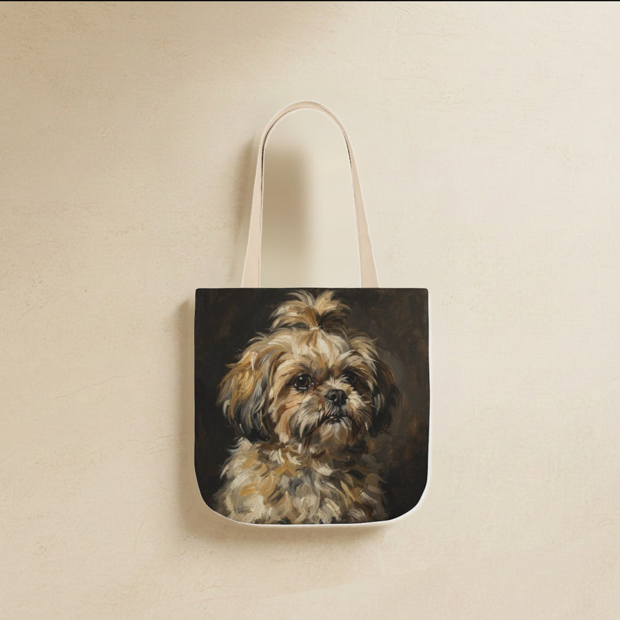 Shih Tzu Tote Bag canvas tote bag hanging by its handles against a warm limestone wall