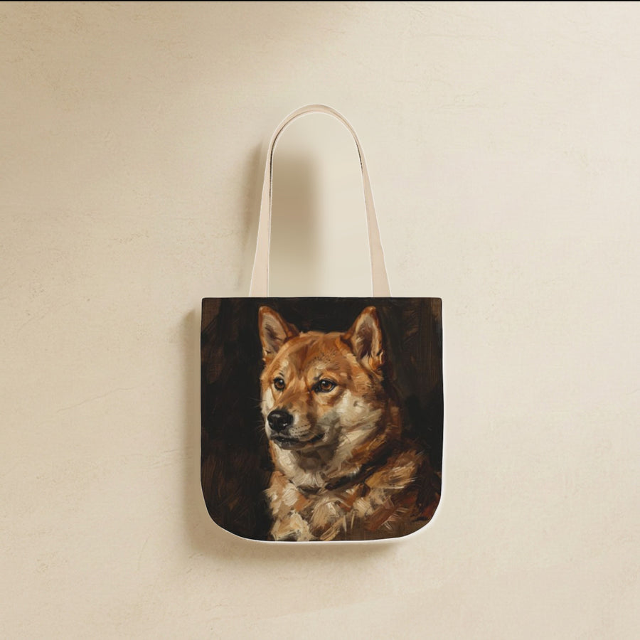 Shiba Inu Tote Bag canvas tote bag hanging by its handles against a warm limestone wall
